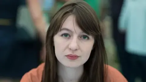 The acclaimed novelist claims she will not visit the UK because of legal concerns
